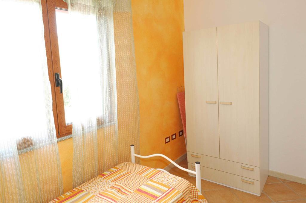 Residence Tanaunella Budoni Pokoj fotografie